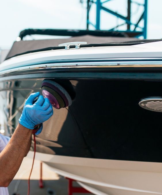 Machine-polishing a hull by hand